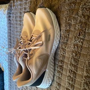 Never worn Nike Revolution 10.5